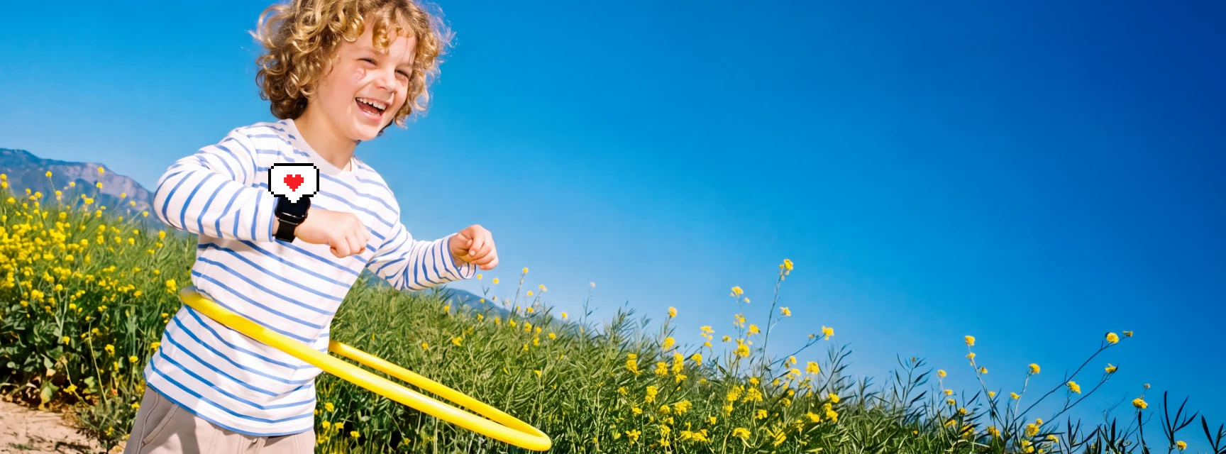 A joyful kid playing with a hula hoop in a sunny wildflower field