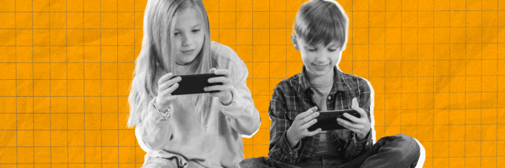 little boy and little girl playing gams on cell phones