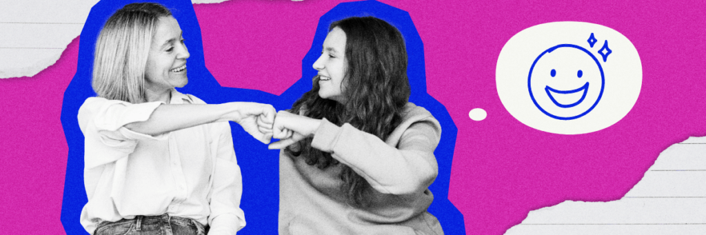 mom and daughter give each other a fist bump and smile