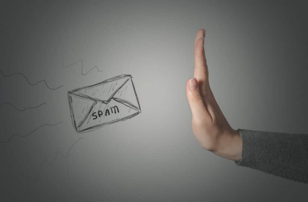 hand saying stop to a spam illustration