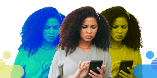picture of a woman looking at her phone with a slightly confused look on her face