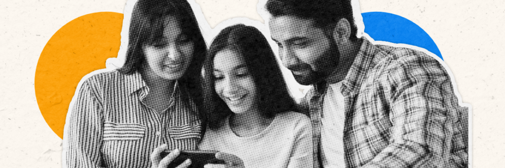 mom dad and daughter looking at her phone