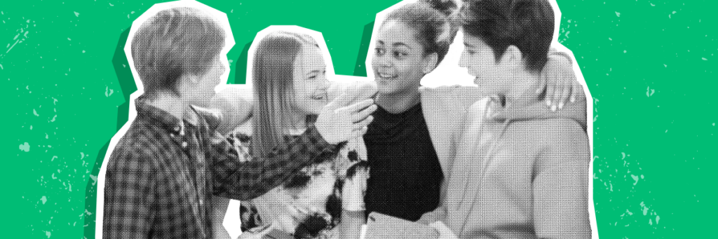 four teens chatting and smiling