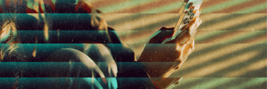 glitching image of someone holding an iphone